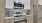 Stainless Steel Appliances Featuring Cabinetry Storage